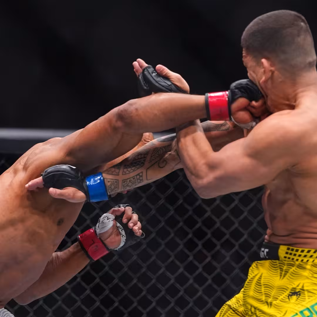 Gregory Rodrigues lands a devastating right hook to the face of Brunno Ferreira during their UFC 326 middleweight clash